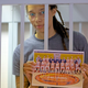 Brittany Griner holding a photo of her WNBA team while in a Russian cell.